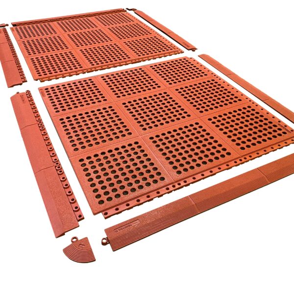 Interlocking Catering Mat tiles and edging pieces are displayed in a grid pattern on a white background, with some parts separated to show how the Interlocking Catering Mat system fits together.