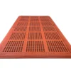 The Interlocking Catering Mat is a large red rectangular rubber mat with a grid pattern and round holes in each square for drainage and slip resistance, shown on a white background.