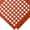 A close-up of the Interlocking Catering Mat reveals its orange-red, textured surface with evenly spaced circular holes in a grid pattern and a bordered row of smaller holes, shown at an angle.