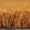 Close-up of the dense, upright bristles of the Weather-Resistant Entrance Mat, highlighting its coarse texture and natural brown fibres against a softly blurred background.