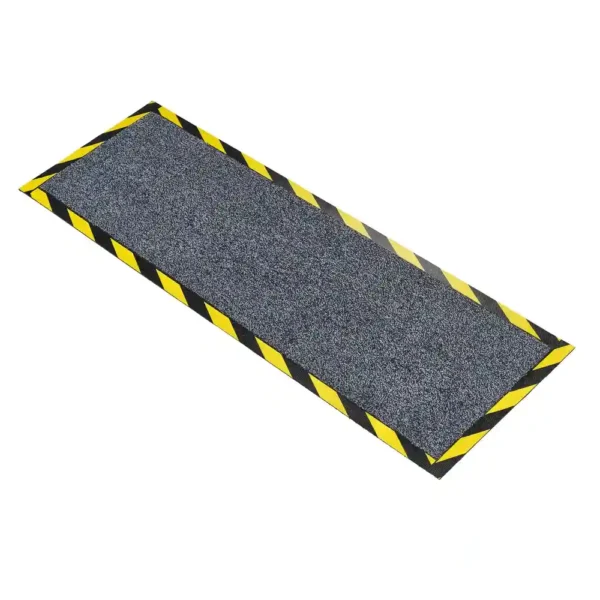 The Cable Protector Mat is a rectangular anti-slip floor mat with a textured grey surface and yellow-and-black striped edges, designed for safety and cable protection.