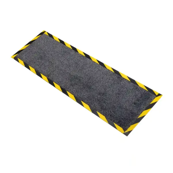 The Cable Protector Mat is a rectangular grey floor mat with yellow and black striped edges, offering a slip-resistant surface whilst highlighting safety zones or hazardous areas.