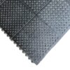Interlocking Chequer Plate Gym Mat features black rubber tiles with a raised diamond plate pattern. Tiles are partially connected, and the textured surface improves grip and slip resistance.