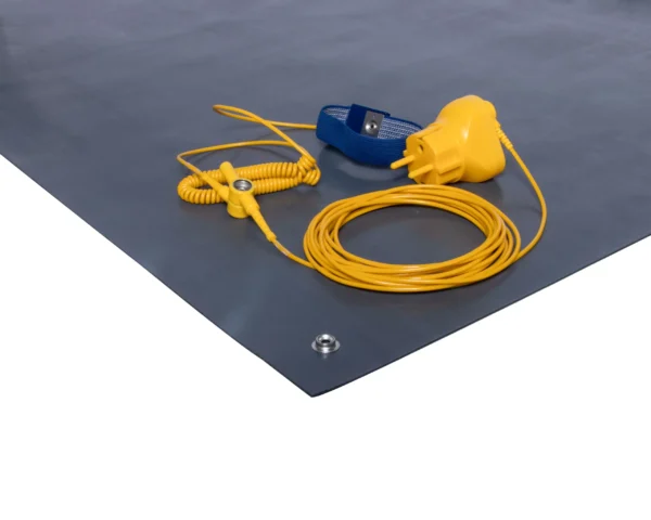 The ESD Anti-Static Double Layer Sheet is grey and includes a yellow earthing cord, yellow plug, blue wrist strap, and features a metal press stud on the corner. All accessories are resting on the mat.