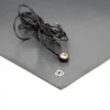 A black lead with a circular connector lies on an ESD Anti-Static Double Layer Sheet in dark grey featuring a metal press stud, set against a white background.