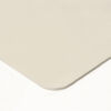 A close-up of the rounded corner of a thin, rectangular Food Quality Rubber Sheet in a light colour, set against a white background.