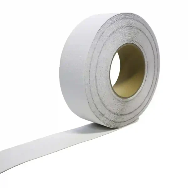 A partially unrolled roll of GRP Grit Tape with a cardboard core is displayed against a plain white background.