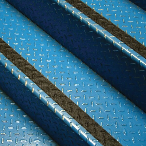Close-up of blue metal stairs with chequer plate pattern, featuring black Anti-Slip Comfortable Tape along the edge of each step. The angled shot displays several parallel steps.