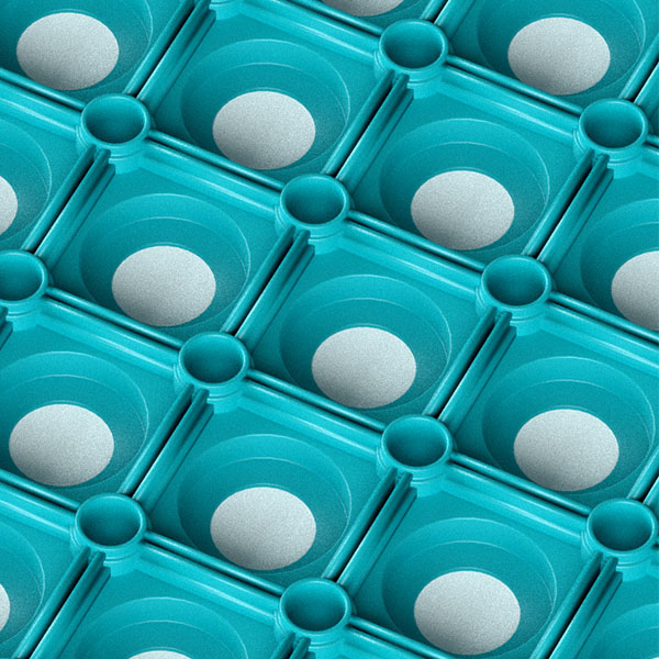 Angled close-up of the Green Grass Mat, showing a repeating pattern of green square cells with circular indents and white centres, creating a geometric and modern look.