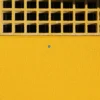 A yellow Anti-Slip Flat Sheet features a grid of square vents at the top and a single screw in the centre of its smooth lower section.