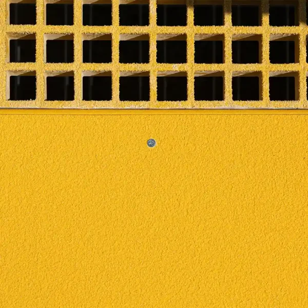 A yellow Anti-Slip Flat Sheet features a grid of square vents at the top and a single screw in the centre of its smooth lower section.