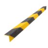 The Anti-Slip Stair Nosing is an L-shaped protector with yellow and black diagonal stripes, designed to cover and cushion sharp edges for safety. Shown against a white background.