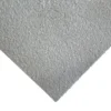 Close-up of the Anti-Slip Sheet’s textured, light grey surface, viewed diagonally, highlighting its rough and slightly bumpy finish for added grip.