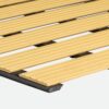 Close-up of the Cross-Ribbed PVC Leisure Mat in beige, featuring textured, ribbed slats evenly spaced on a black metal frame, shown at an angle against a plain white background.
