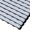 Close-up of the Cross-Ribbed PVC Leisure Mat, featuring a textured light grey surface with parallel slats and small gaps for water drainage and improved grip on wet surfaces.
