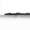A close-up of the Nitrile Workplace Mat's rough, textured edge with a blurred, gear-like object resting on top against a plain white background.
