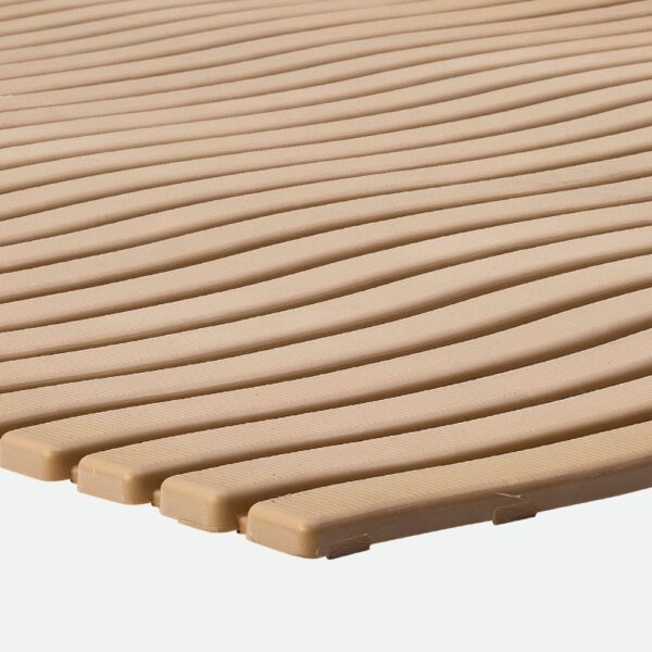 Close-up of the Swimming Pool Mat shows a beige, textured surface with parallel, slightly curved lines and rounded edges, resembling flexible matting.