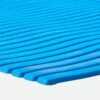 Close-up of a Swimming Pool Mat in blue, featuring a textured surface with evenly spaced diagonal raised ridges that form parallel lines.