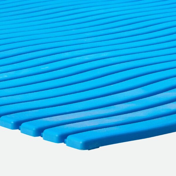 Close-up of a Swimming Pool Mat in blue, featuring a textured surface with evenly spaced diagonal raised ridges that form parallel lines.