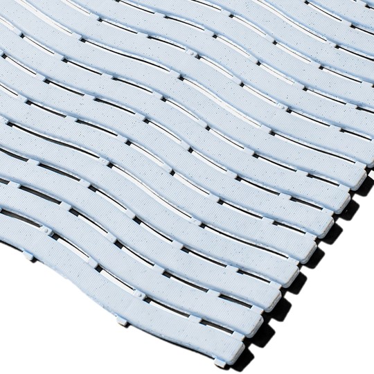 Close-up of Swimming Pool Mat: light blue interlocking plastic tiles with a wavy, textured, non-slip surface arranged diagonally on a white background.