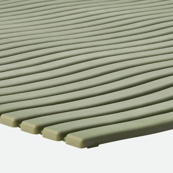 Close-up of the Swimming Pool Mat in light green, featuring evenly spaced diagonal ridges. The mat appears soft, flexible, and textured for comfort and safety.