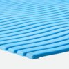 Close-up of several blue Swimming Pool Mat strips arranged in parallel rows with gentle curves, forming a wavy pattern against a white background.