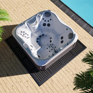 rubber mat for leisure with a hot tub over it|interlocking anti fatigue mat top view|interlocking anti fatigue mat close up of side interlocks|Cushion Link Bevels
