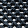 Close-up of the Custom Oil Resistant Mat, featuring a black rubber surface with a diamond-textured grid and circular holes for drainage and anti-slip functionality.