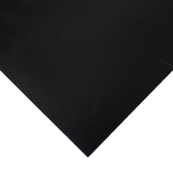 A close-up of Electrical Insulation Matting, black and rectangular with a textured surface, positioned at an angle to display its fine horizontal lines.