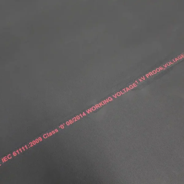 Electrical Safety Matting in black rubber features a red printed line listing specifications, such as working voltage and standard compliance details.