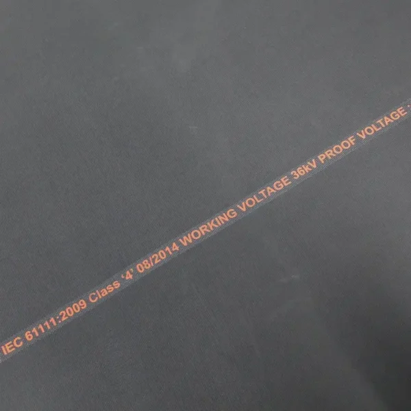 A close-up of Electrical Safety Matting in black shows red text: IEC 61111:2009 Class 4 08/2014, WORKING VOLTAGE 36kV, PROOF VOLTAGE.