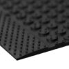 Close-up of the Dirt Remover Mat, featuring a black textured rubber surface with circular and linear raised bumps arranged in patterns.