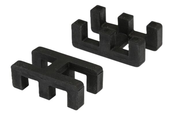 Two black, rectangular Self-Draining PVC Mat Connectors with prongs facing different directions are shown interlocked on a white background.