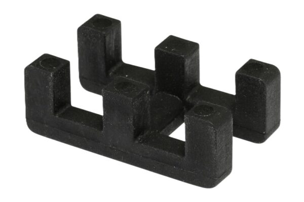Black, rectangular Self-Draining PVC Mat Connector with four upright, evenly spaced square prongs featuring small circular indentations on top, used for organising or separating mat components.