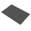 Heavy-Duty Heavy Traffic Doorway Mat in black features a rectangular shape and a textured, raised bubble surface, displayed against a white background.