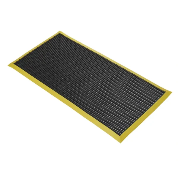 The Safety Cross-Ribbed Mat is a rectangular black anti-fatigue floor mat with a textured surface and bevelled yellow edges, displayed on a white background.