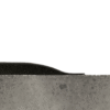 Cross-section of a concrete slab with the Welding Anti-Fatigue Mat, featuring a black foam or rubber layer on top, highlighting the contrasting textures and materials.