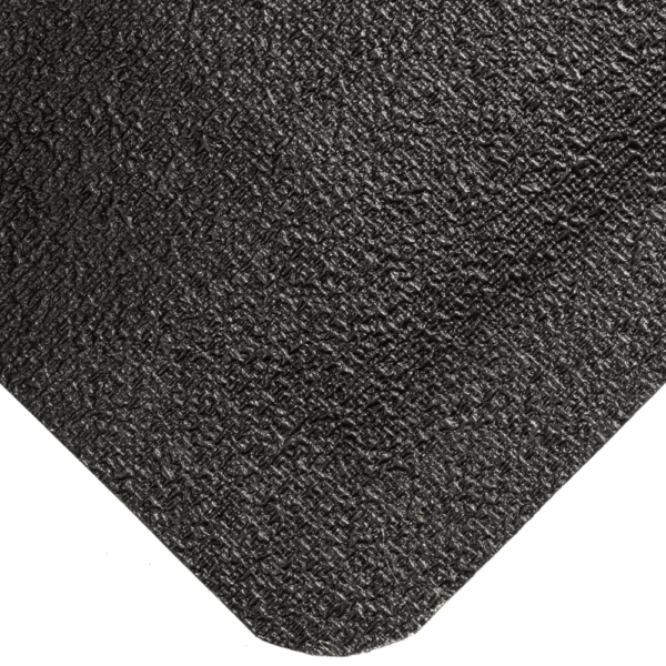 Close-up of the Welding Anti-Fatigue Mat’s textured black rubber surface, featuring detailed grain and a slightly curved corner.