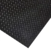 A close-up of the Fine Ribbed Matting Roll in black, showcasing its raised fine ribbed pattern and durable metal construction, photographed at an angle.