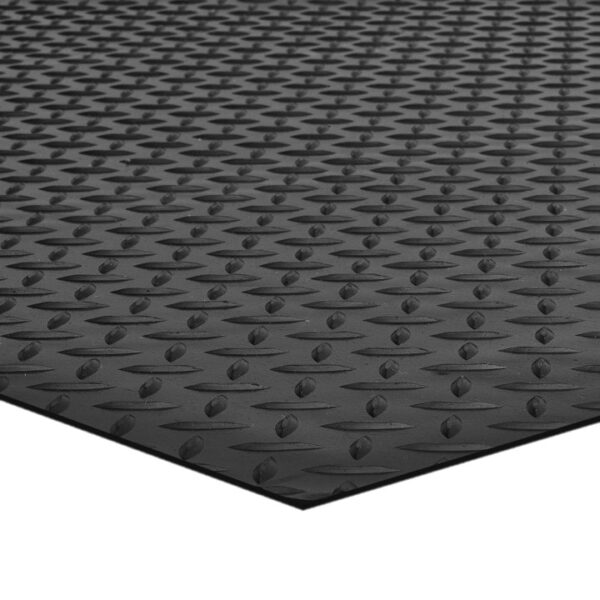 A close-up of Chequer Plate Rubber Matting in black, featuring a raised diamond pattern with repeating angled shapes across its rubber surface.
