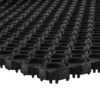 A close-up view of the Playground Safety Mat, a black rubber mat featuring large circular holes and raised textured edges, designed for use as an anti-fatigue or drainage floor mat.