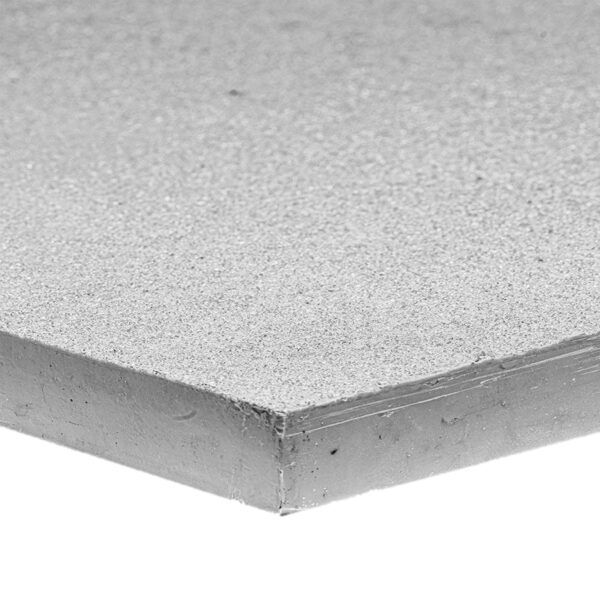 A close-up view of the corner of a Solid Top Grating, highlighting its smooth, flat grey surface and neatly layered edges.