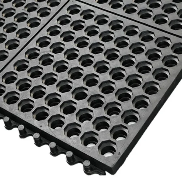 Close-up of Fine Ribbed Matting Roll in black rubber, featuring interlocking edges and a textured fine ribbed surface.