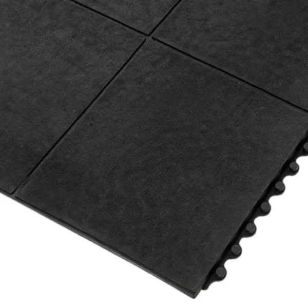 Close-up of Fine Ribbed Matting Roll showing interlocking black rubber tiles with textured surfaces and visible connecting edges on the right side.