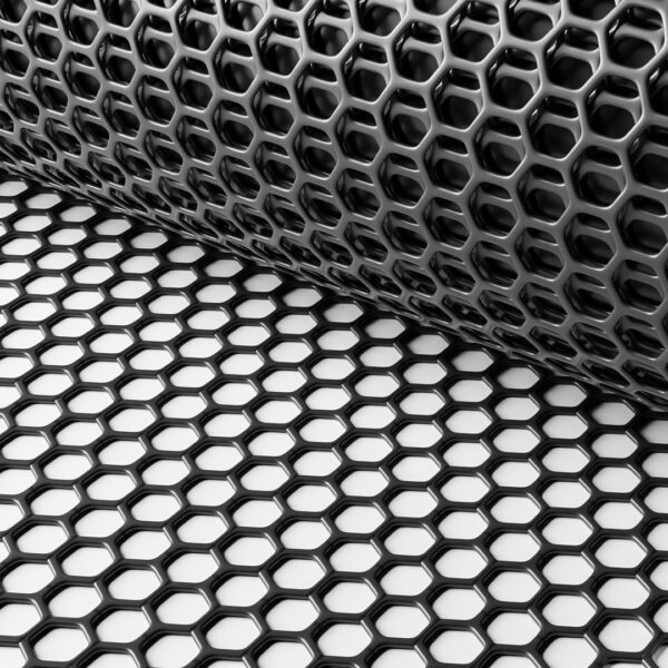 A close-up of Grass Mat Underlay Mesh, partially unrolled on a flat surface. Its hexagonal pattern, resembling a honeycomb, is highlighted by light and shadows that accentuate the mesh’s 3D texture.