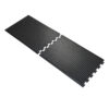 Two Interlocking Air Cushioned Mats in black, featuring raised dot textured surfaces, are aligned side by side and partially connected at their jigsaw-style edges.