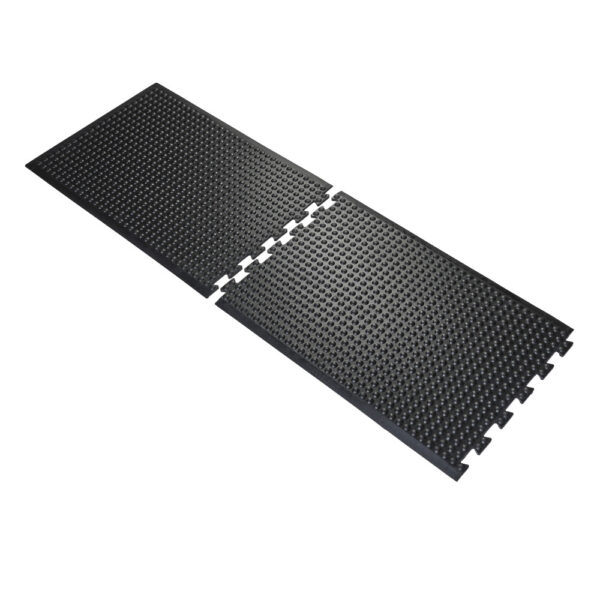 Two Interlocking Air Cushioned Mats in black, featuring raised dot textured surfaces, are aligned side by side and partially connected at their jigsaw-style edges.