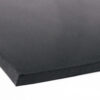 A close-up of Black Commercial Rubber, featuring smooth surfaces and straight edges, displayed on a white background.