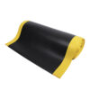 The Diamond Anti-Fatigue Mat in black features a textured surface and bright yellow borders, shown partially unrolled against a white background.