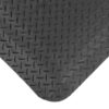 Close-up view of the Premium Anti-Fatigue Mat, featuring a black chequer plate surface with raised oval patterns and a rounded bottom edge.